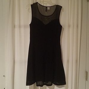 Black dress with mesh accents